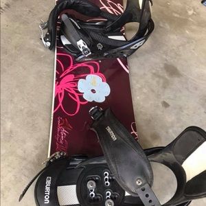 Atomic snow board and burton bindings